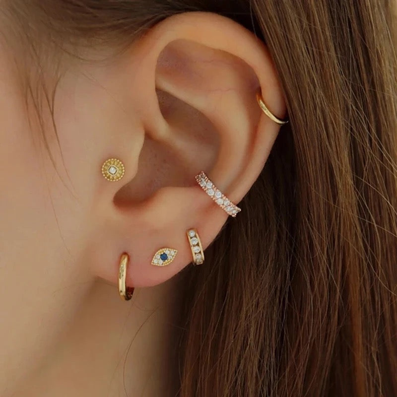 EVIL EYE PIERCING